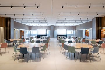 a room with tables and chairs