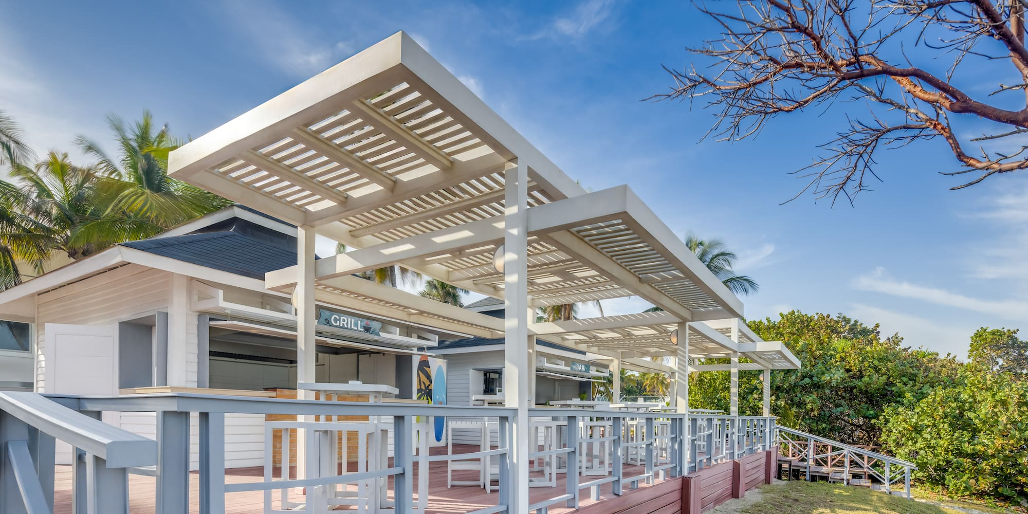 a white building with a covered roof