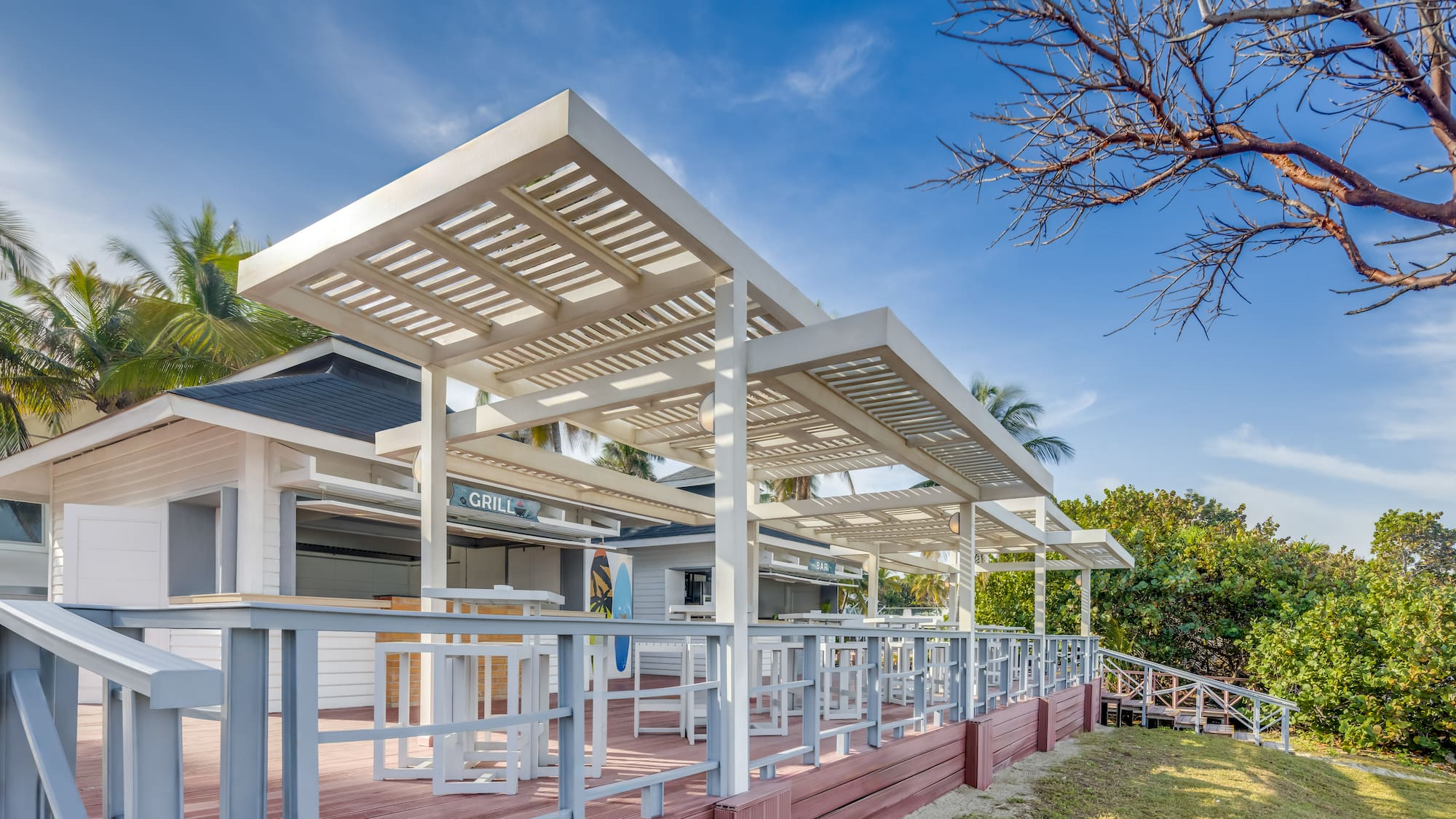 a white building with a covered roof