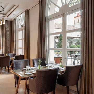 a room with tables and chairs