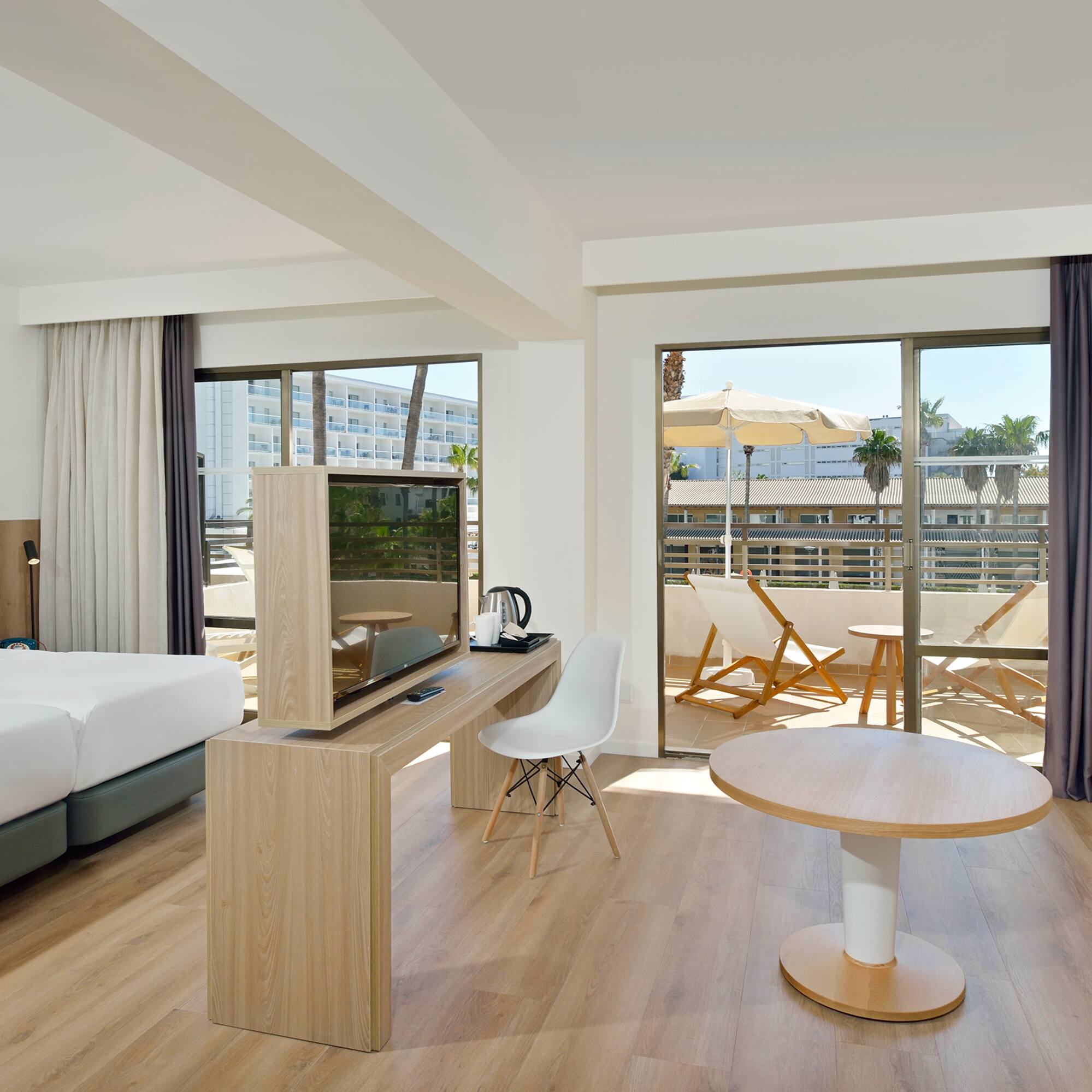 a room with a table and a television