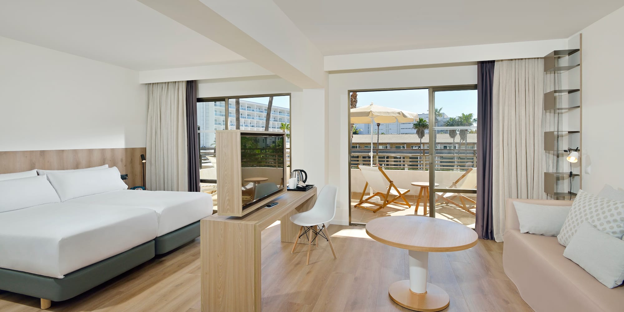 a room with a table and a television