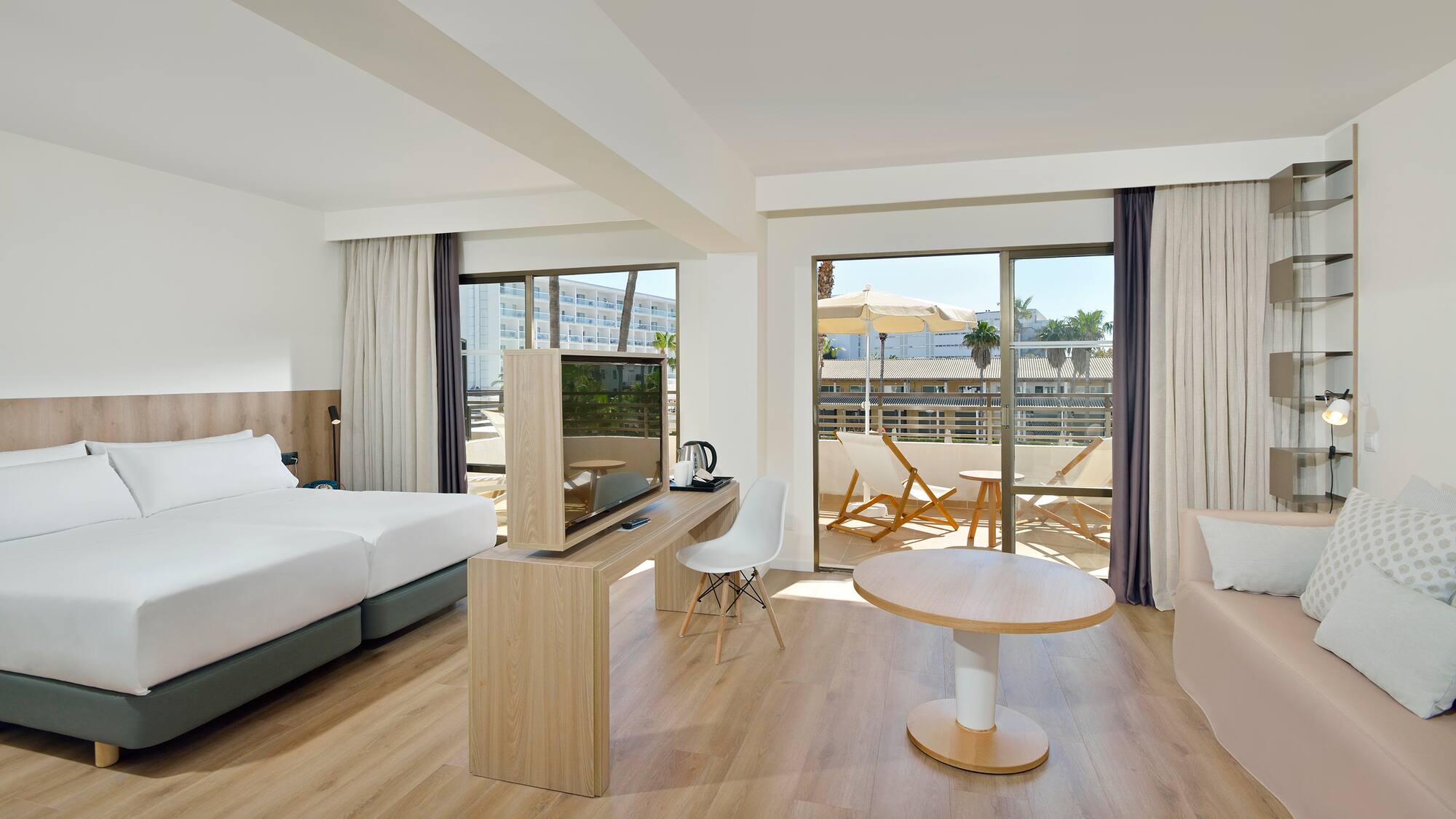 a room with a table and a television