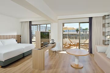 a room with a table and a television