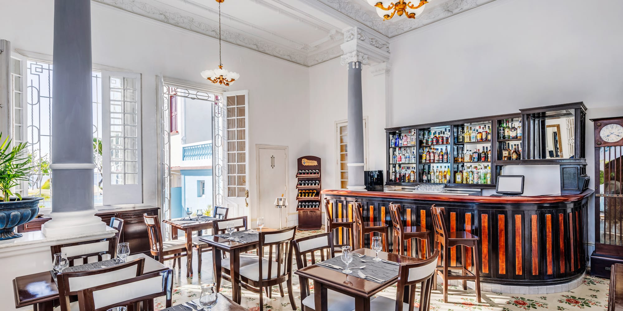 a room with tables and chairs
