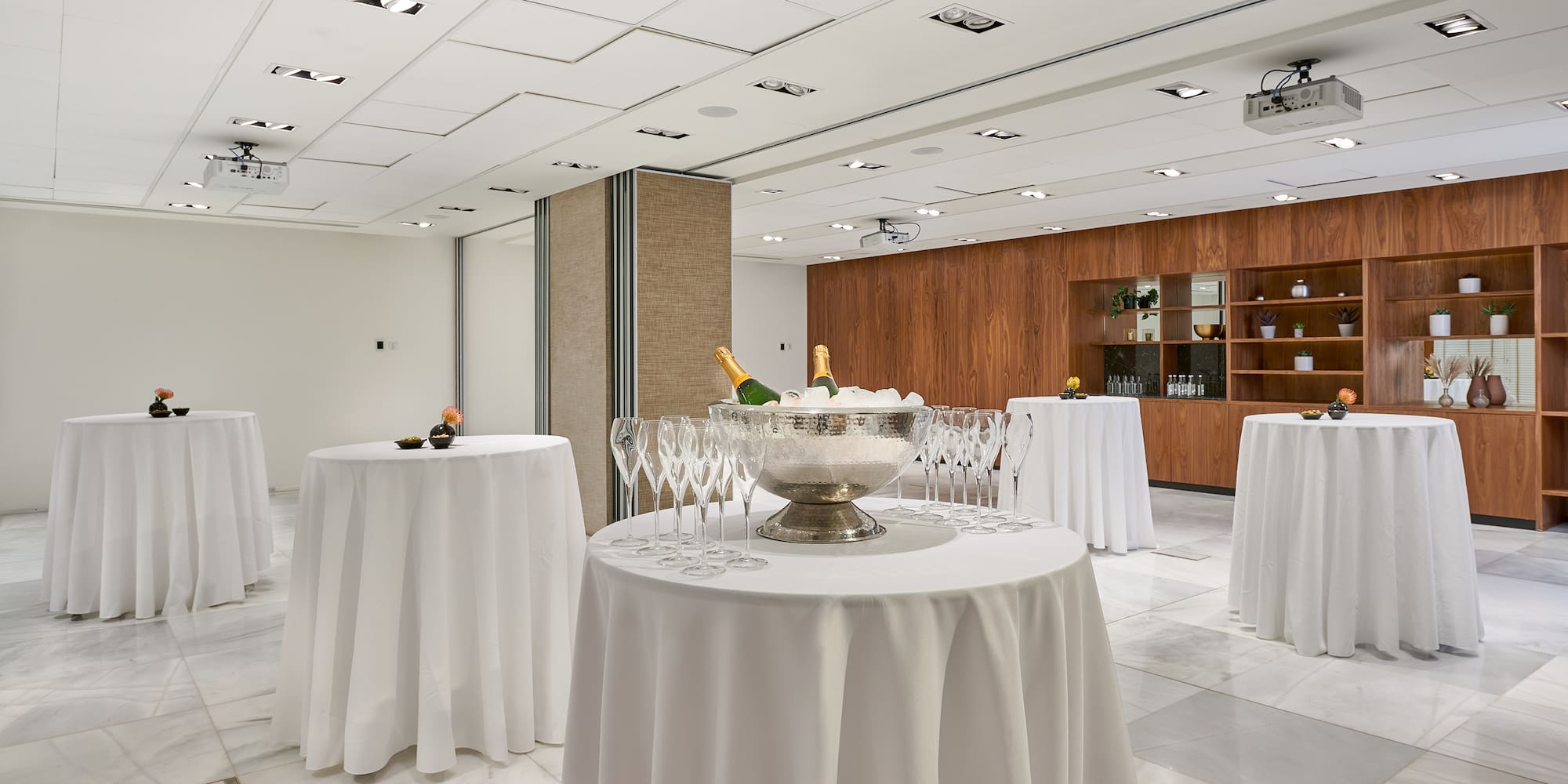 a room with tables and chairs