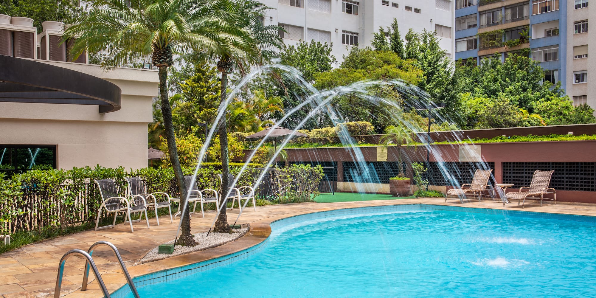 a pool with water spouting out of it