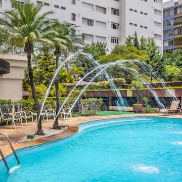 a pool with water spouting out of it