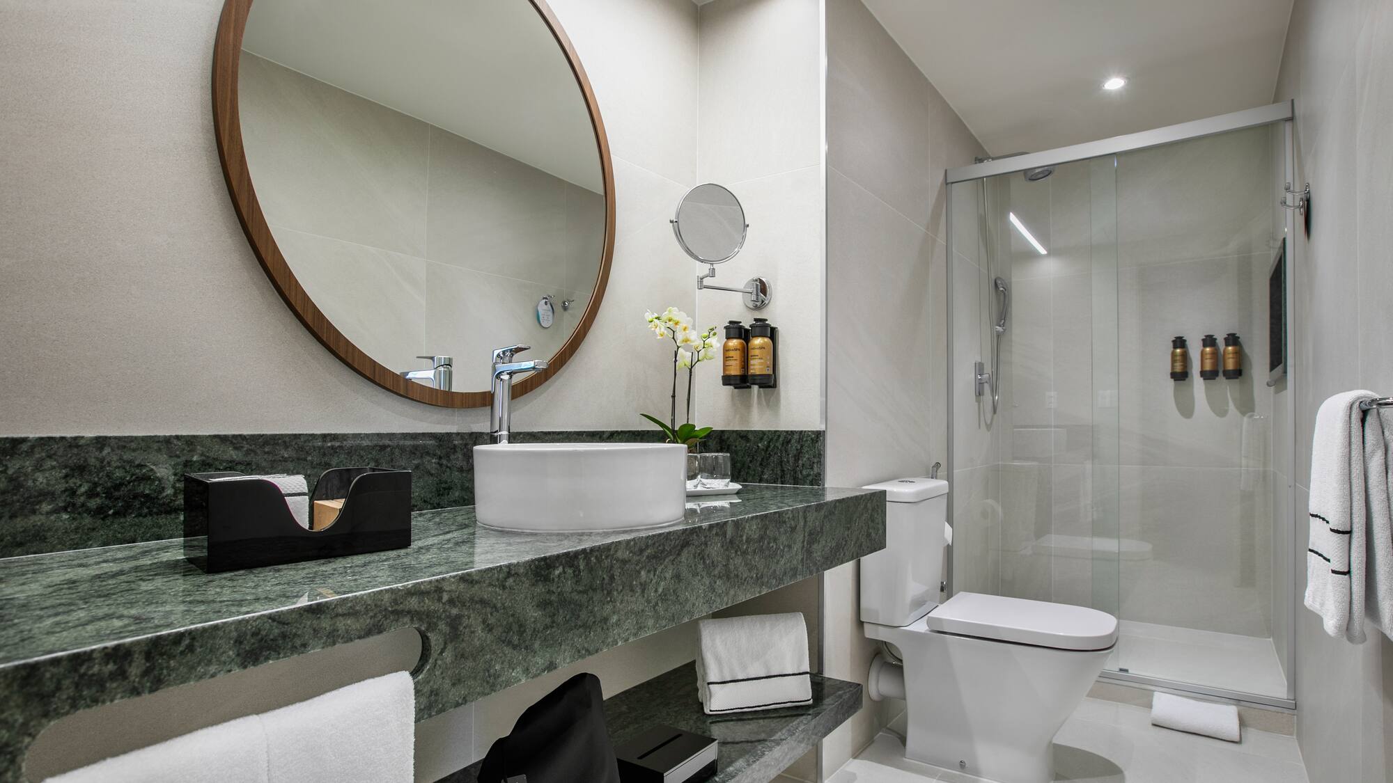a bathroom with a mirror and sink