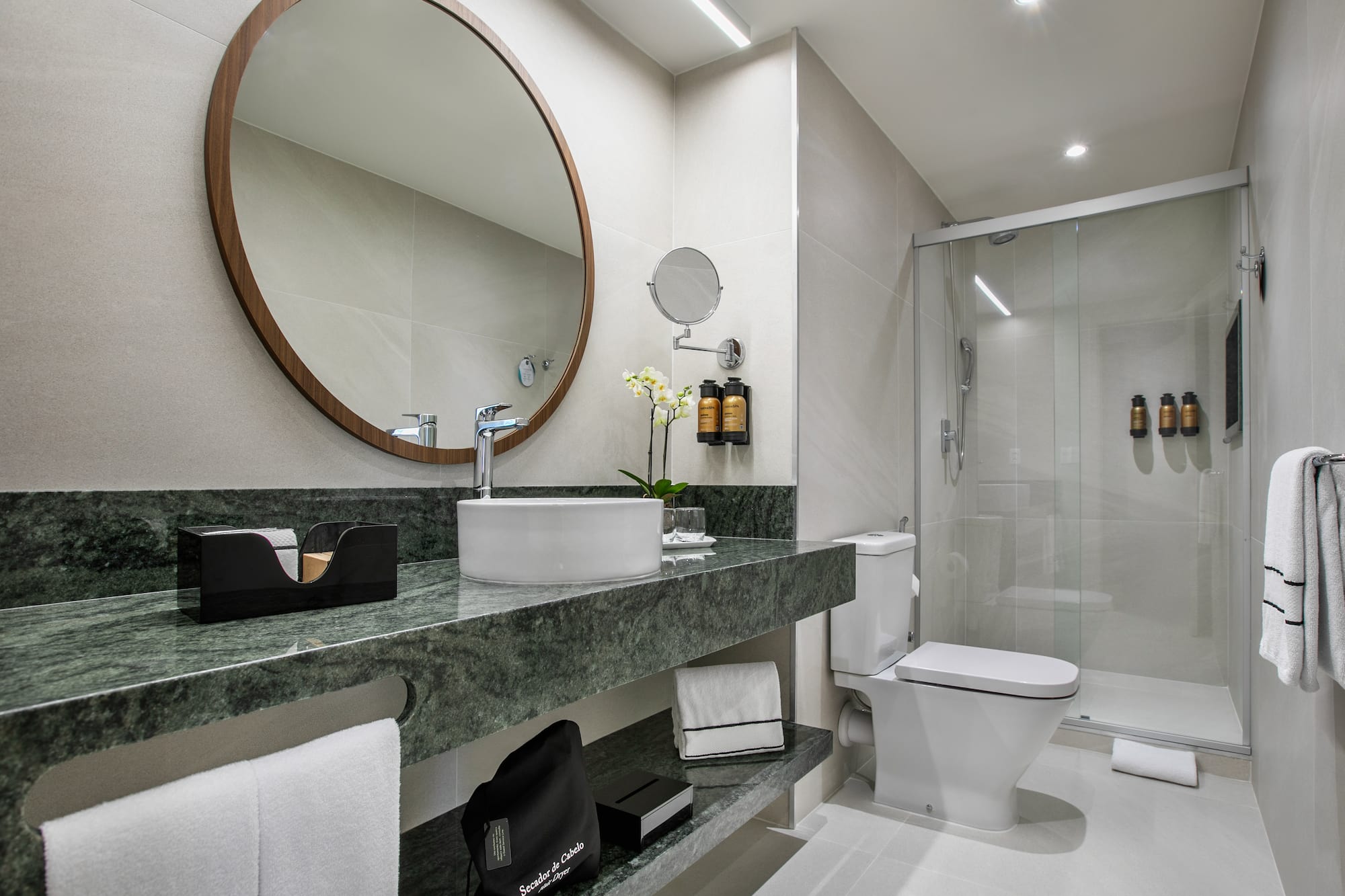 a bathroom with a mirror and sink