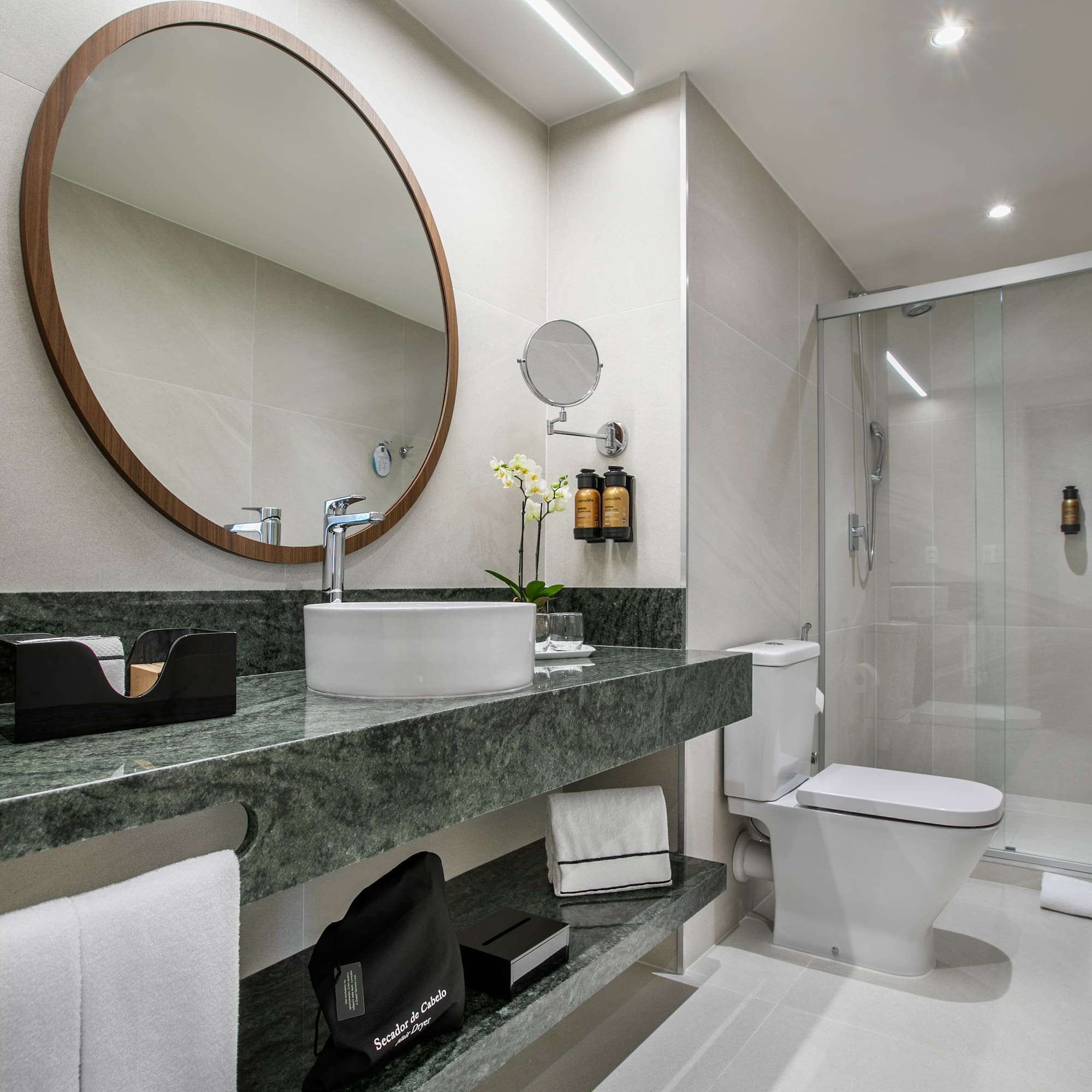 a bathroom with a mirror and sink