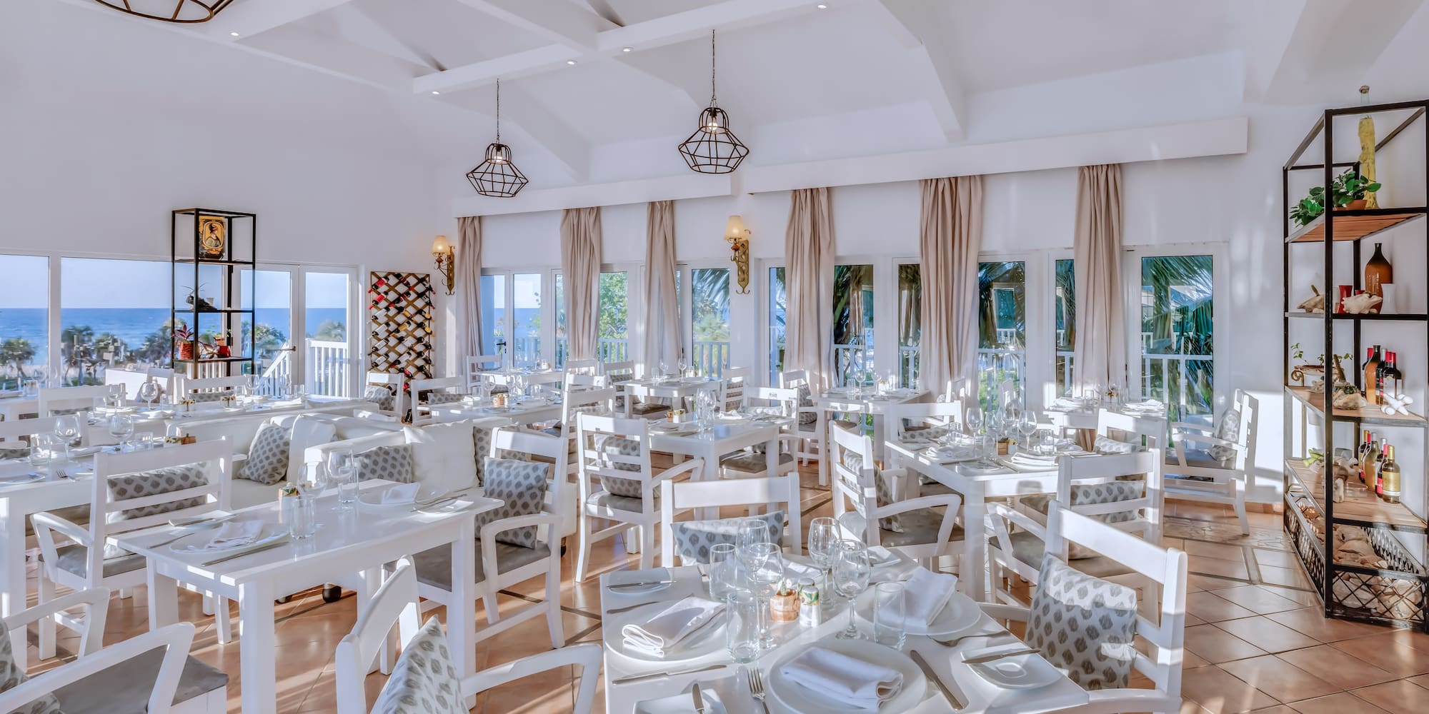 a room with tables and chairs