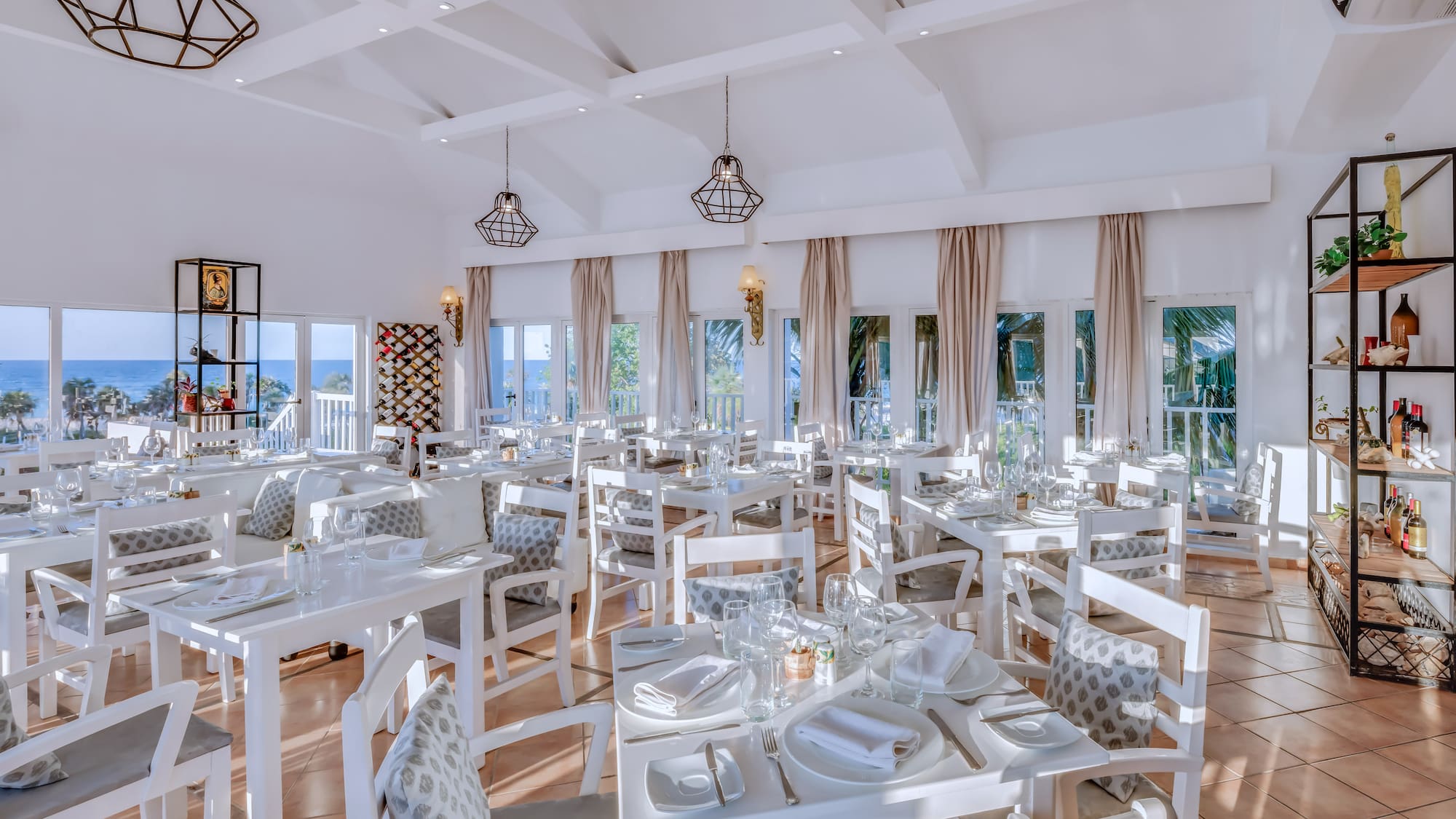 a room with tables and chairs