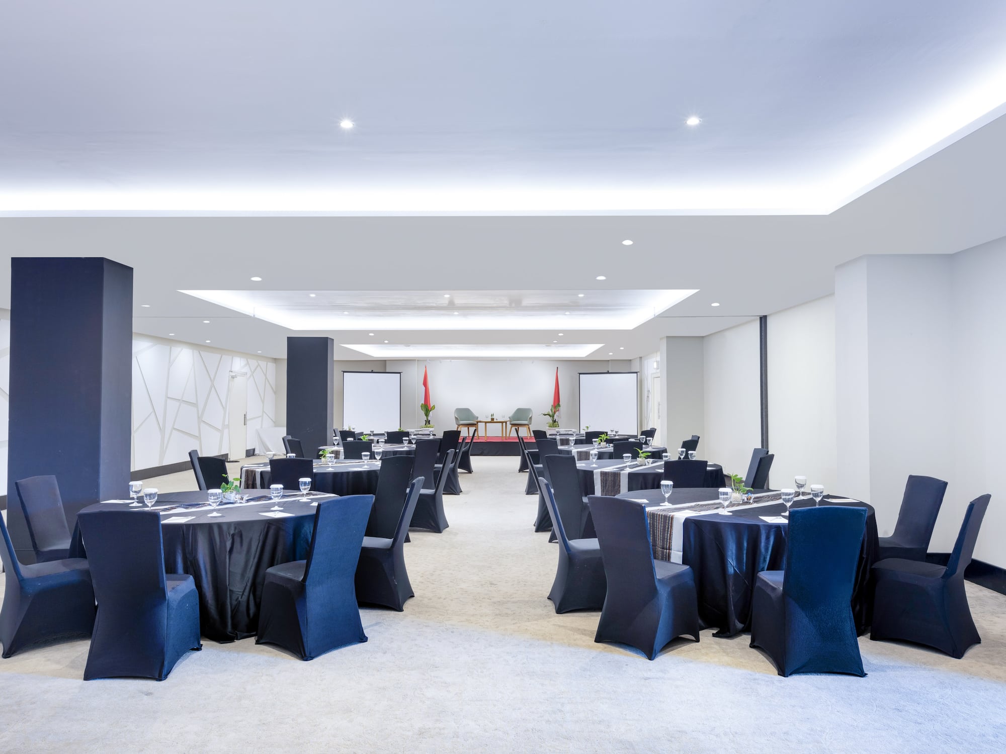 a room with tables and chairs