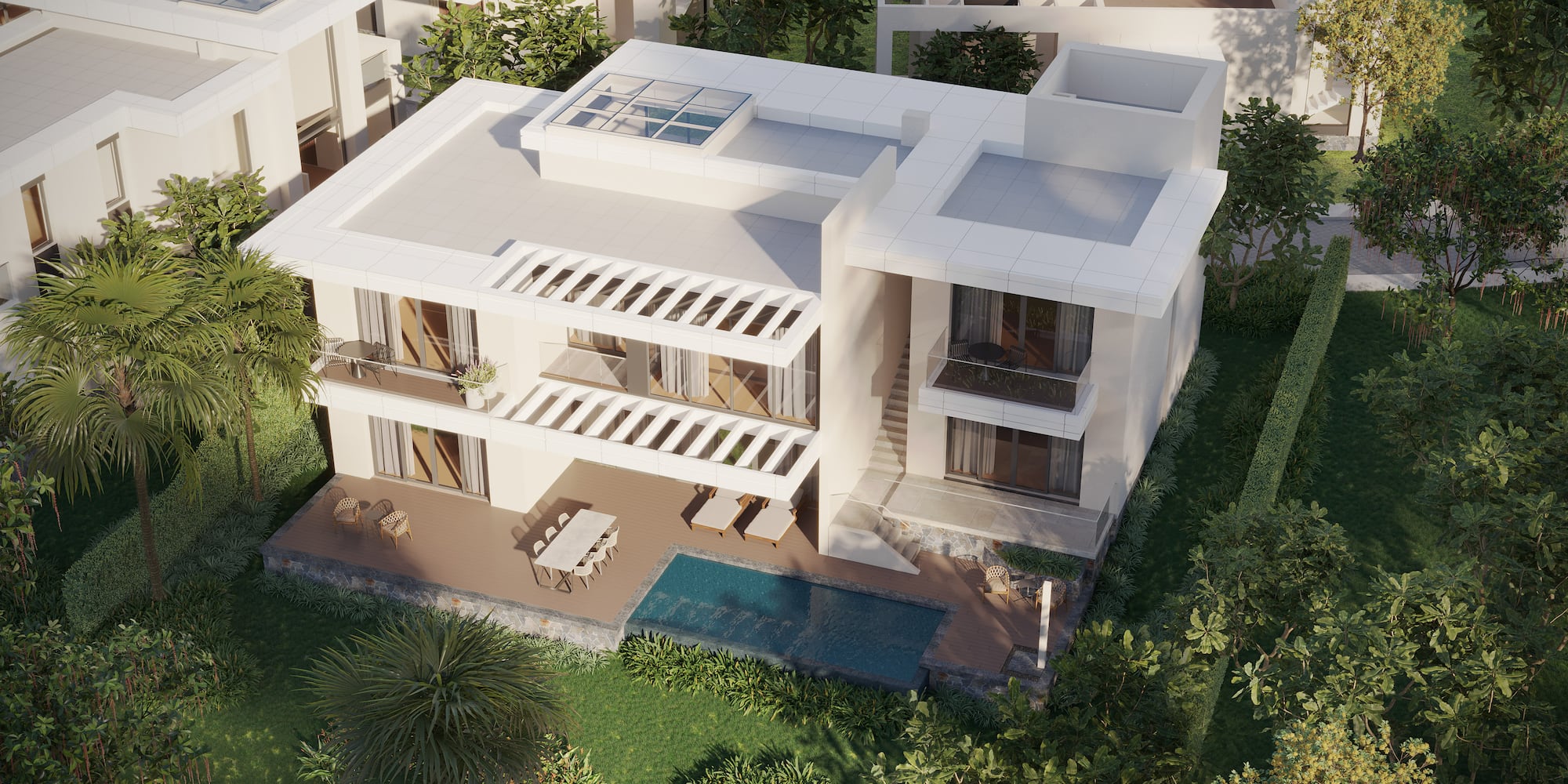 a room with two beds and a table and chairs