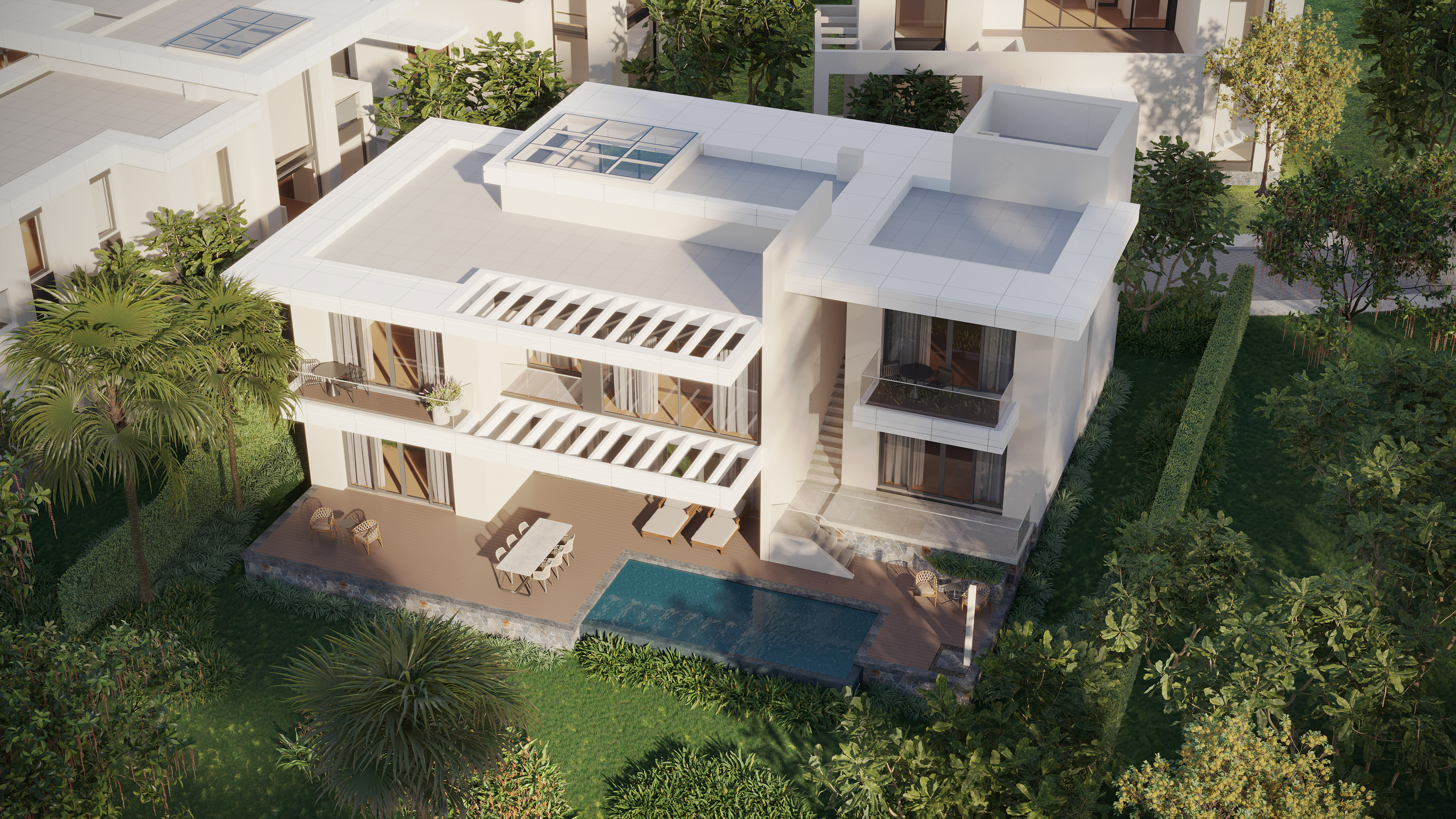Aerial view: White modern villa with private pool, outdoor deck, and tropical garden.