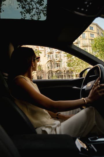 a woman driving a car