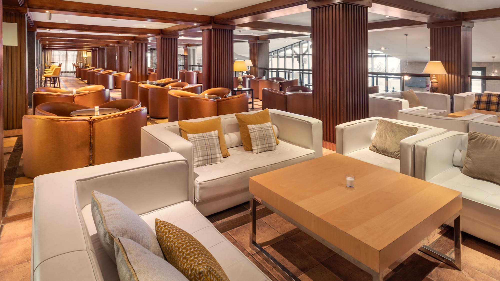 a room with a large table and chairs