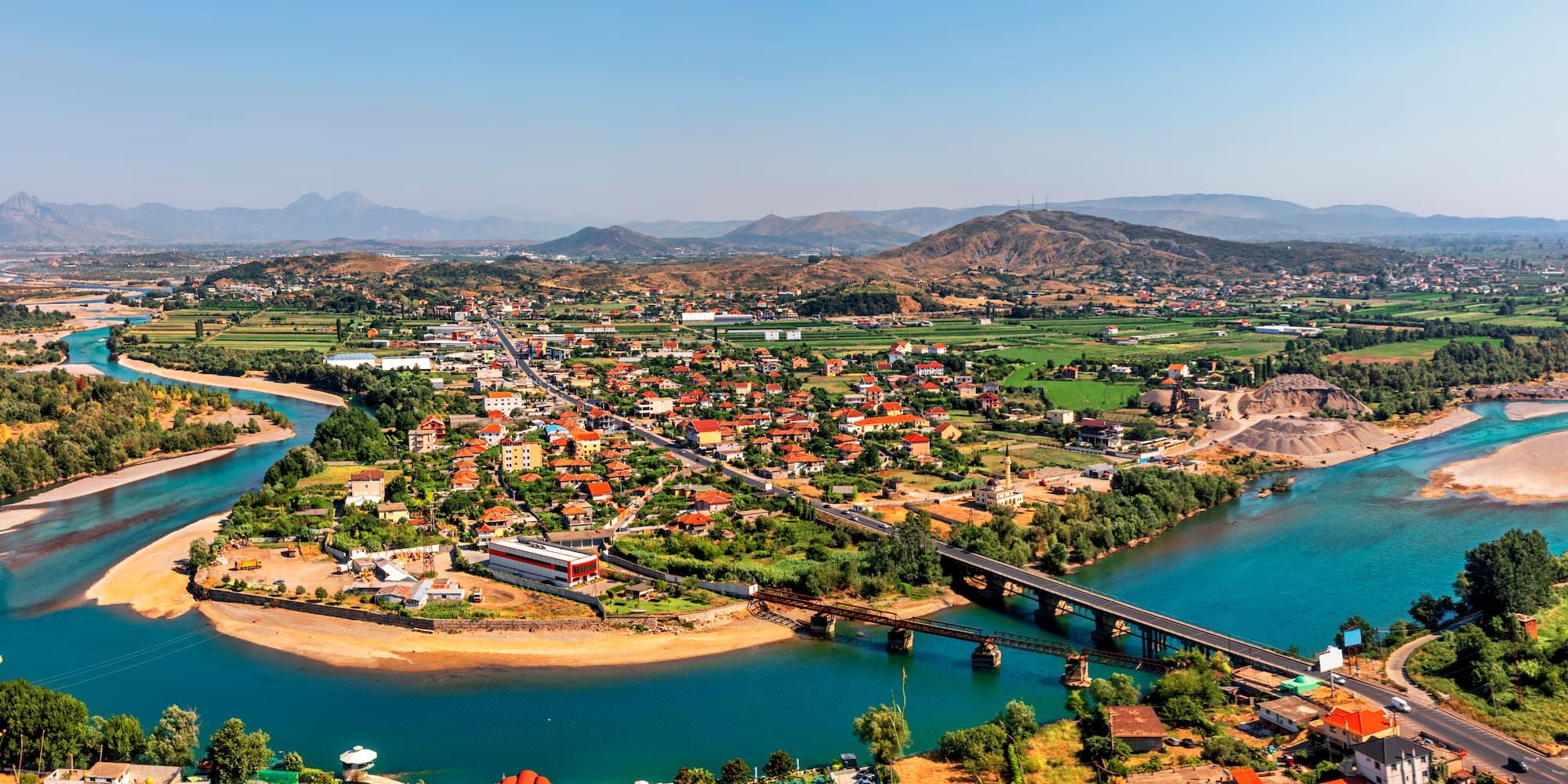 a city next to a body of water