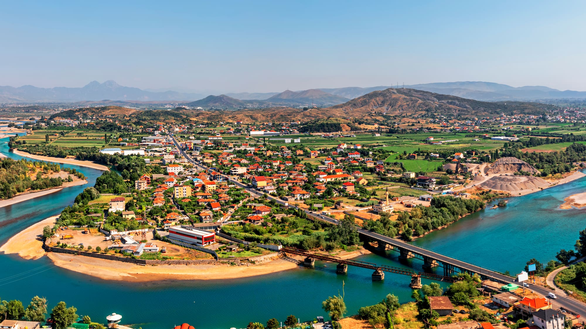 a city next to a body of water