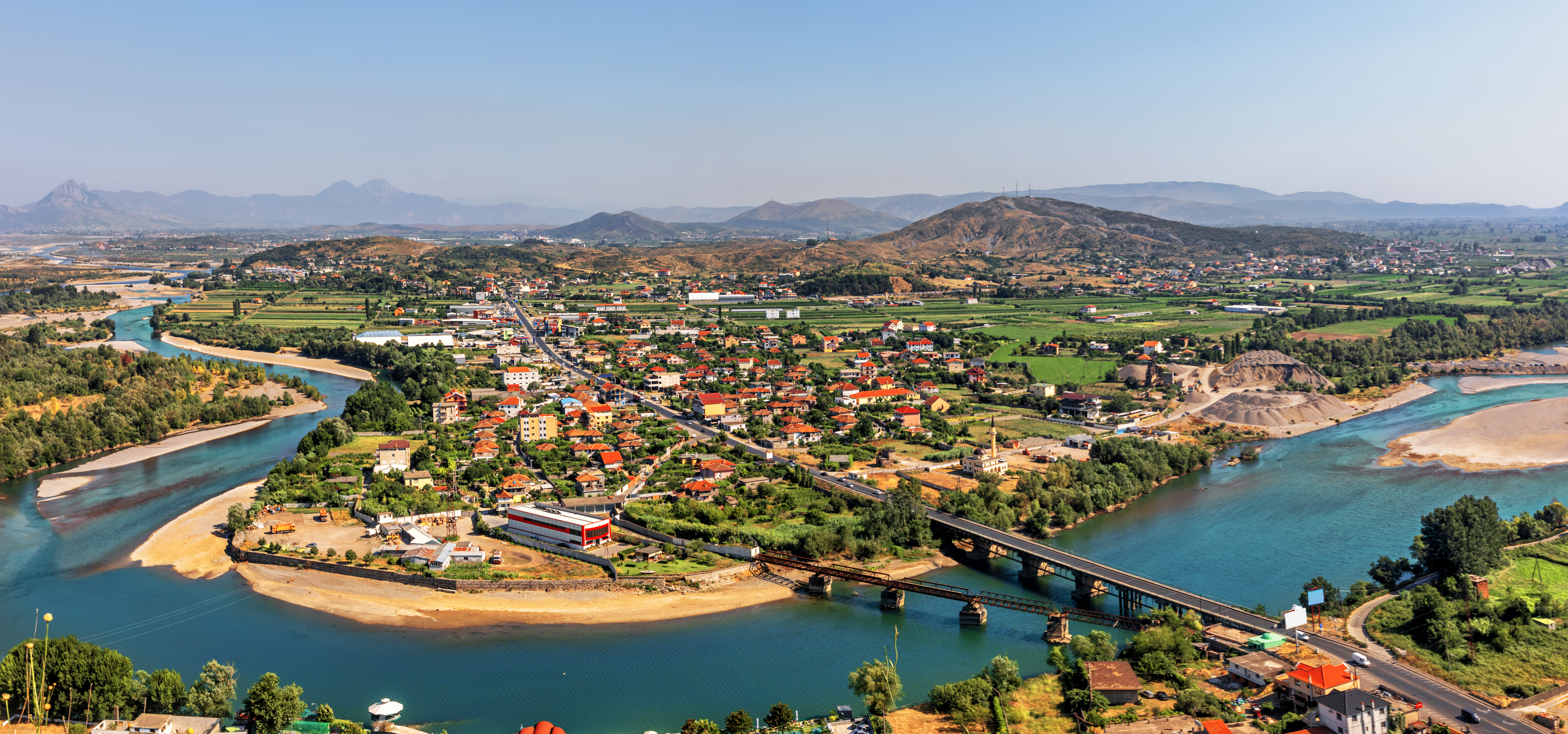 a city next to a body of water