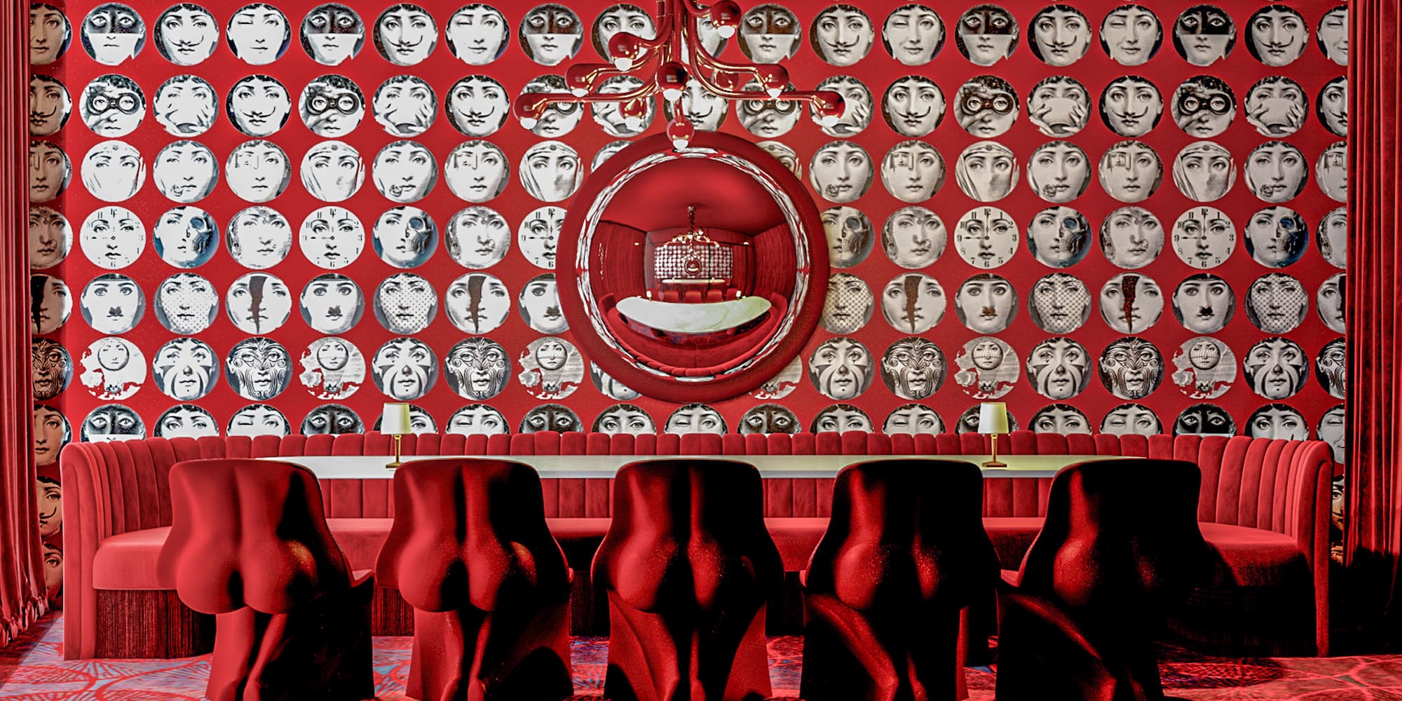 a room with red chairs and a mirror