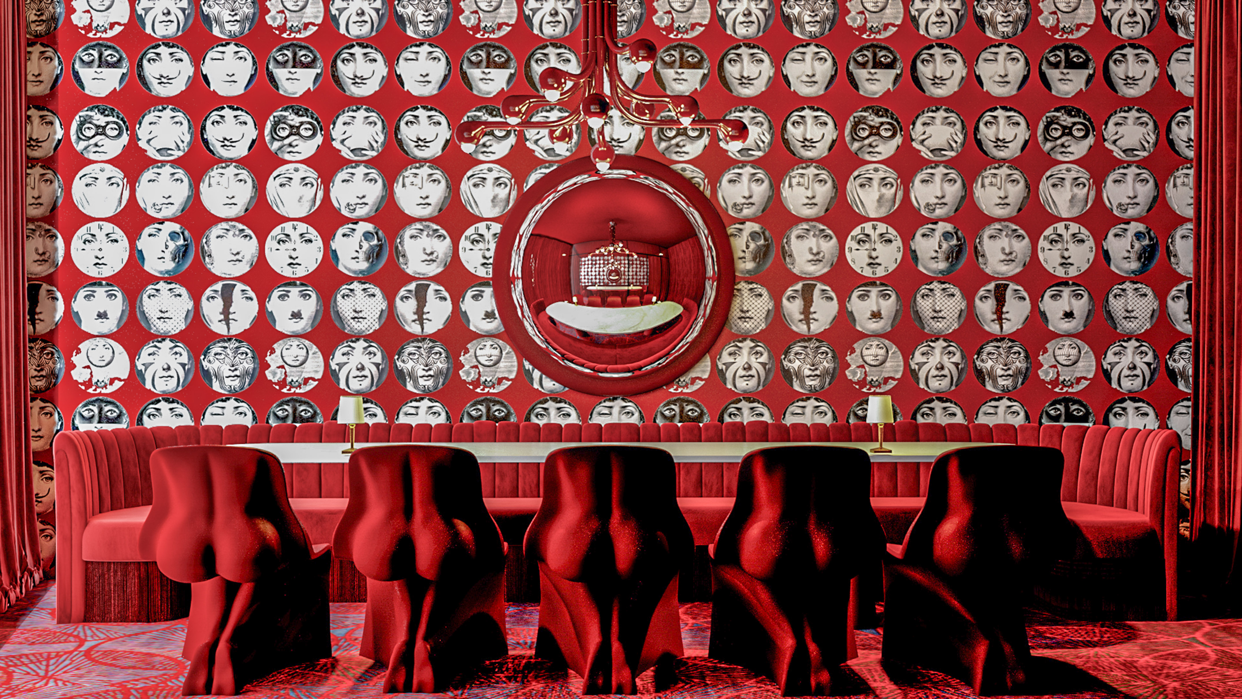 a room with red chairs and a mirror