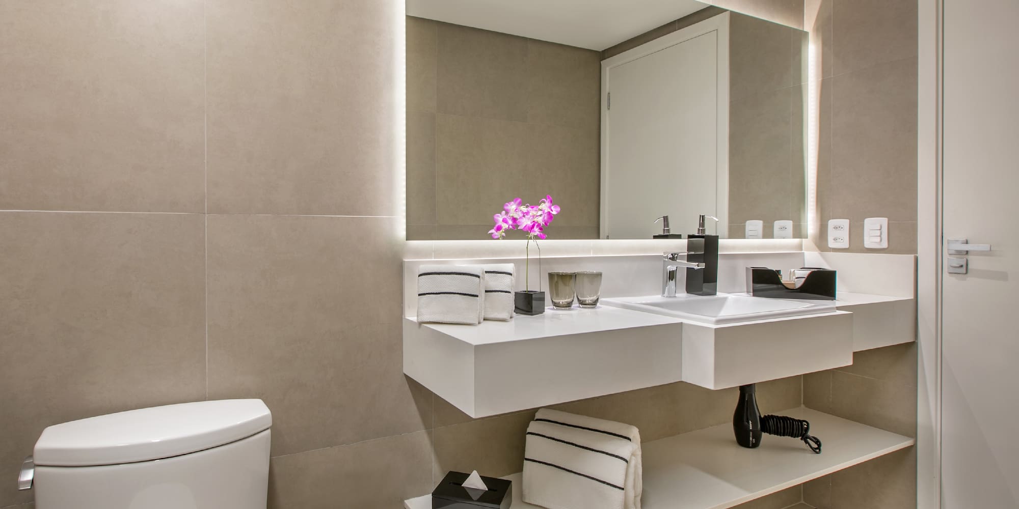 a bathroom with a sink and a toilet