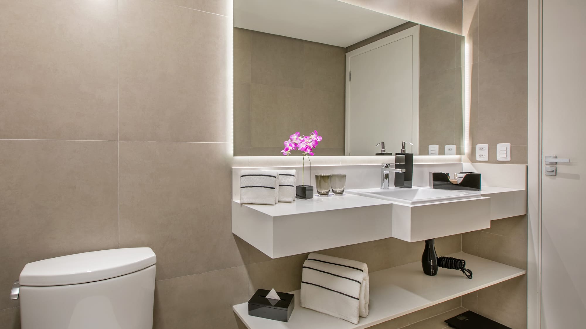 a bathroom with a sink and a toilet