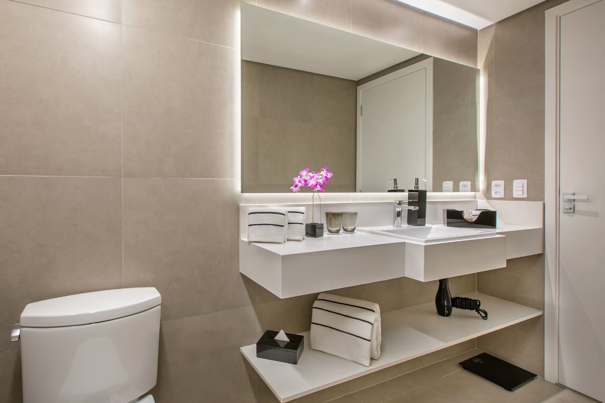 a bathroom with a sink and a toilet