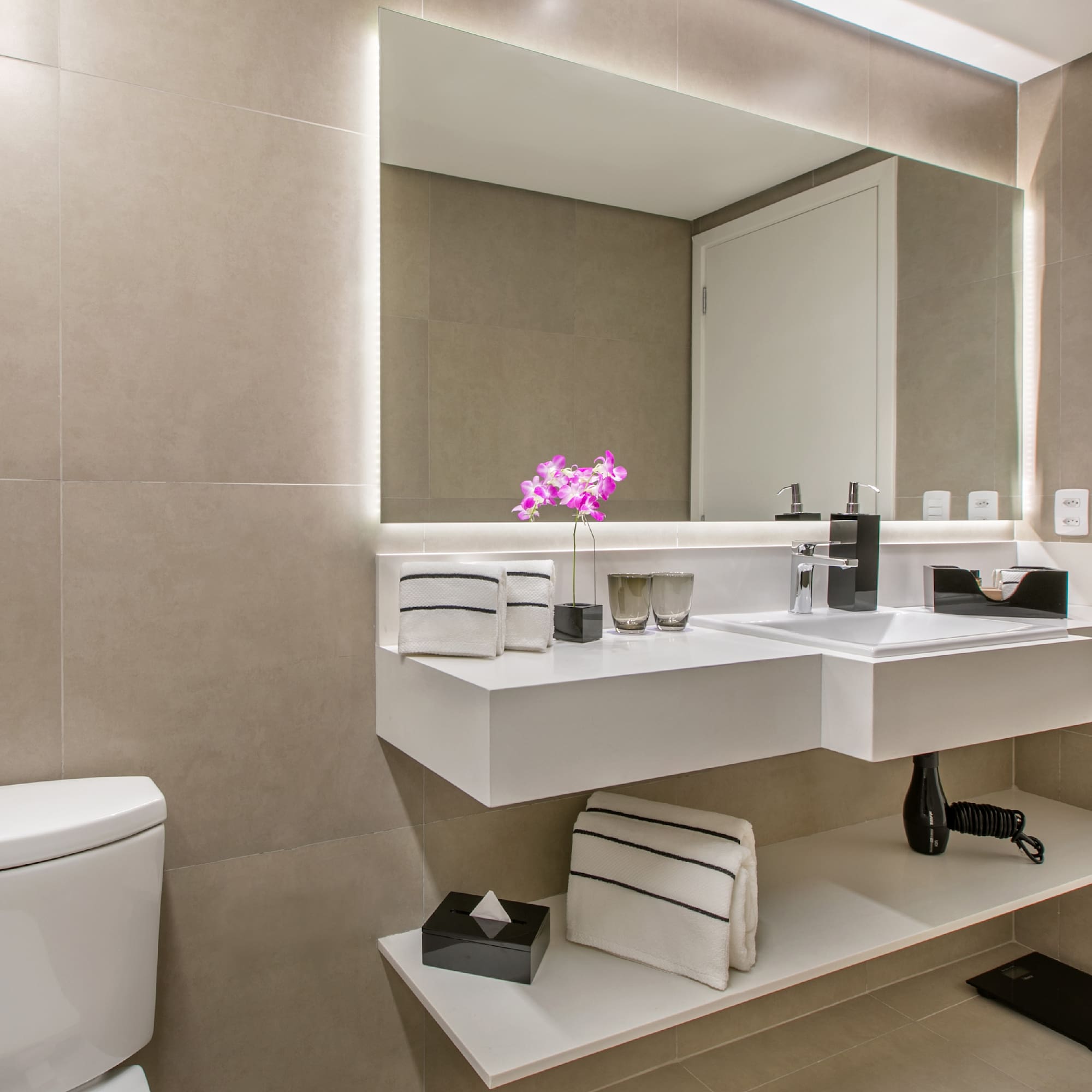 a bathroom with a sink and a toilet