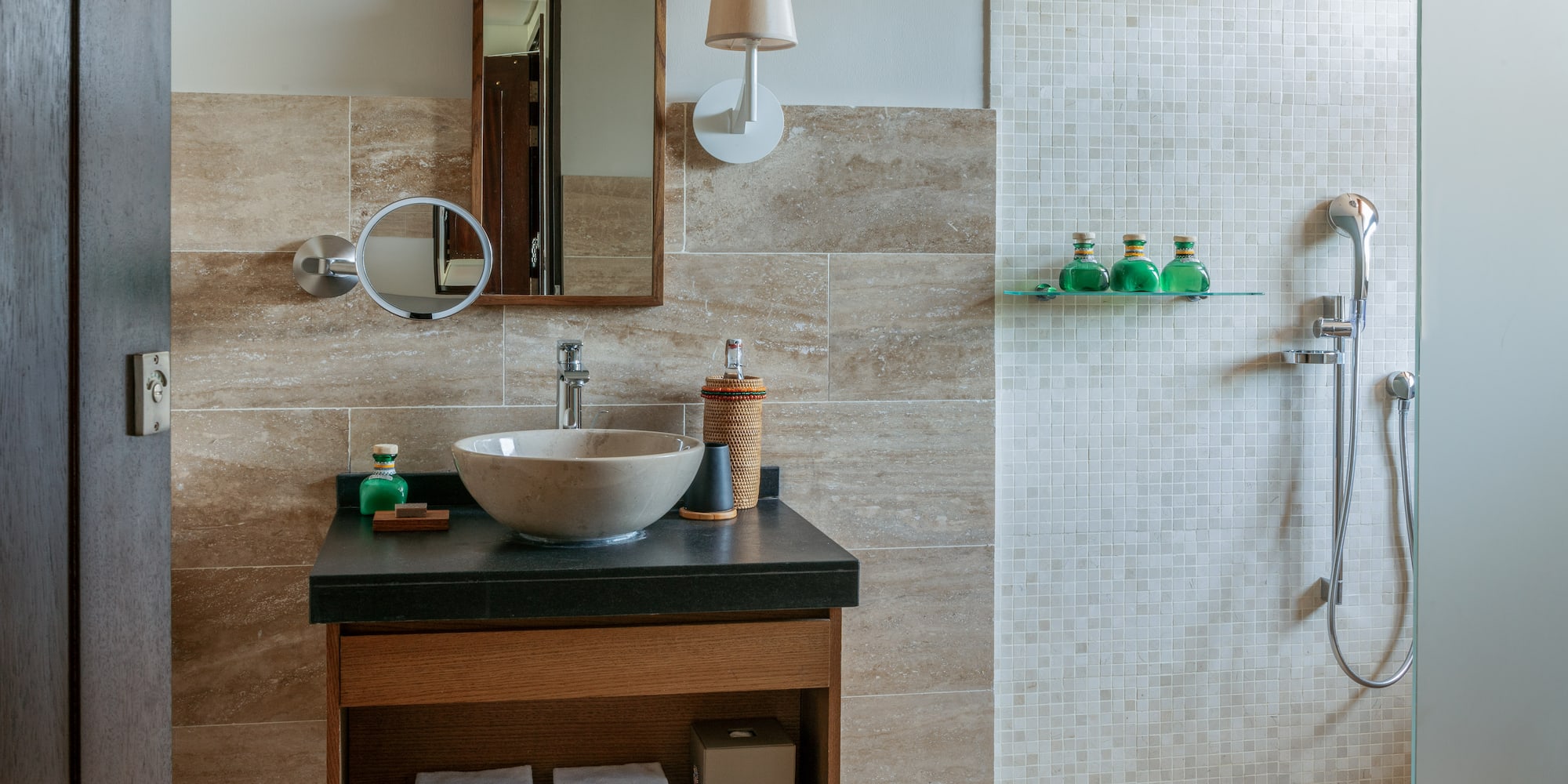 a bathroom with a sink and mirror