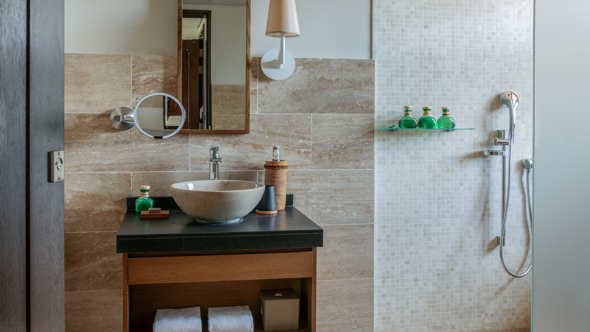 a bathroom with a sink and mirror