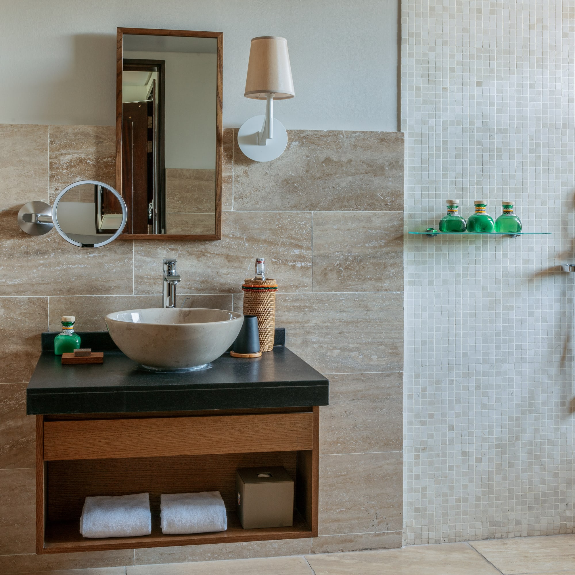 a bathroom with a sink and mirror