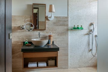 a bathroom with a sink and mirror