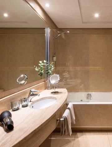 a bathroom with a sink and a bathtub