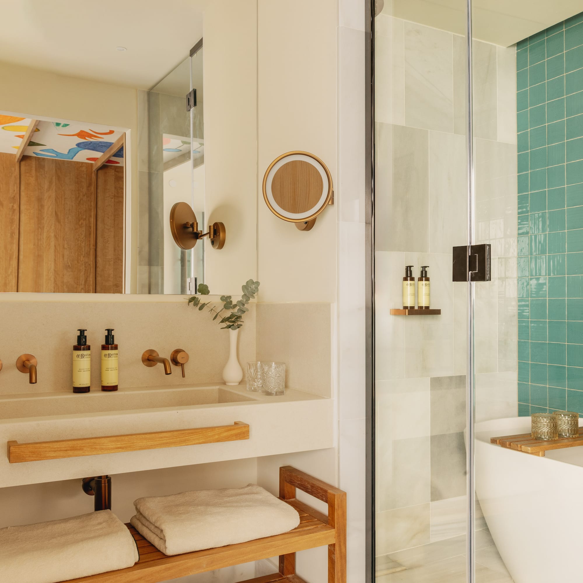 a bathroom with a shower and a sink