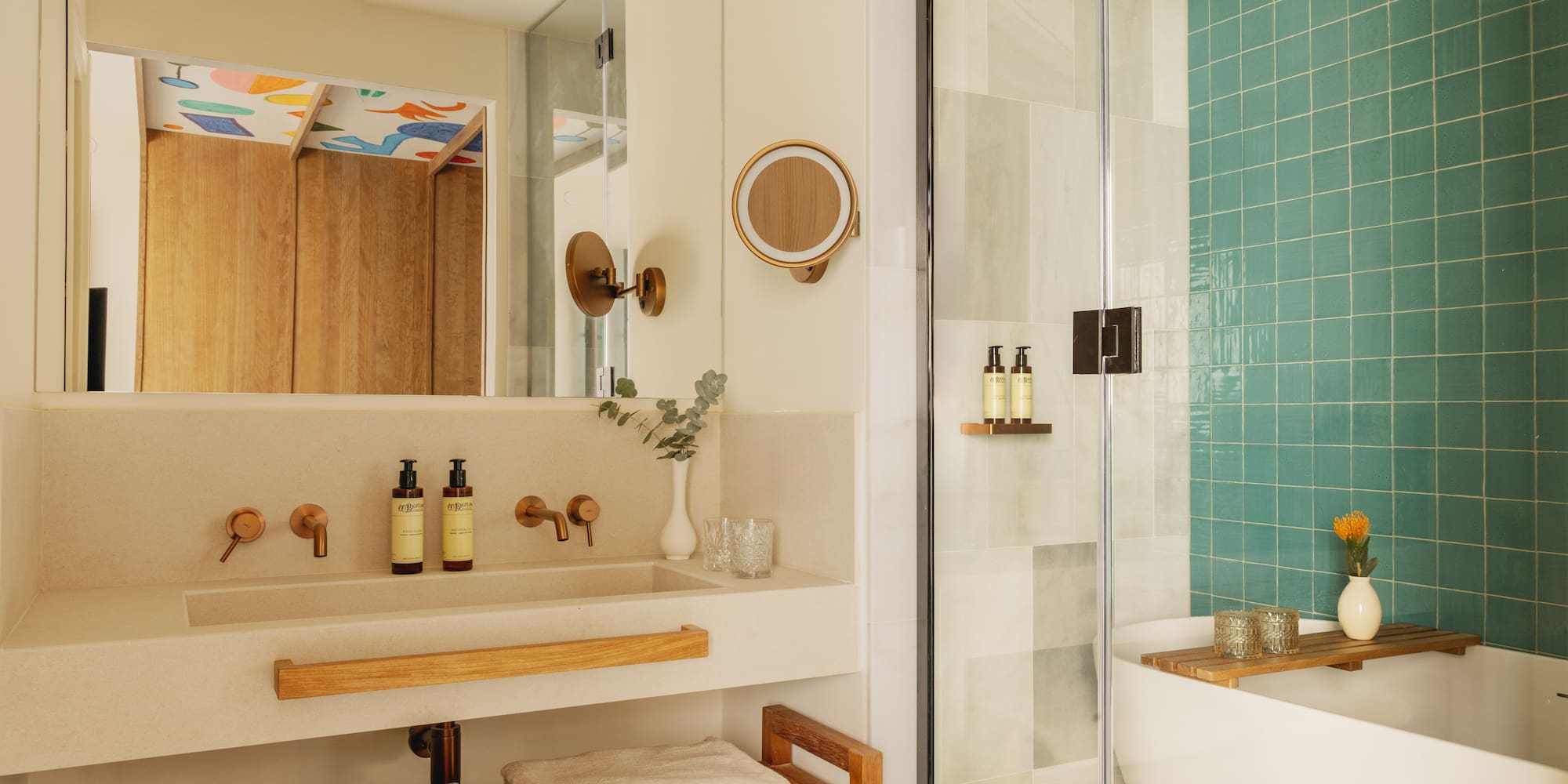 a bathroom with a shower and a sink