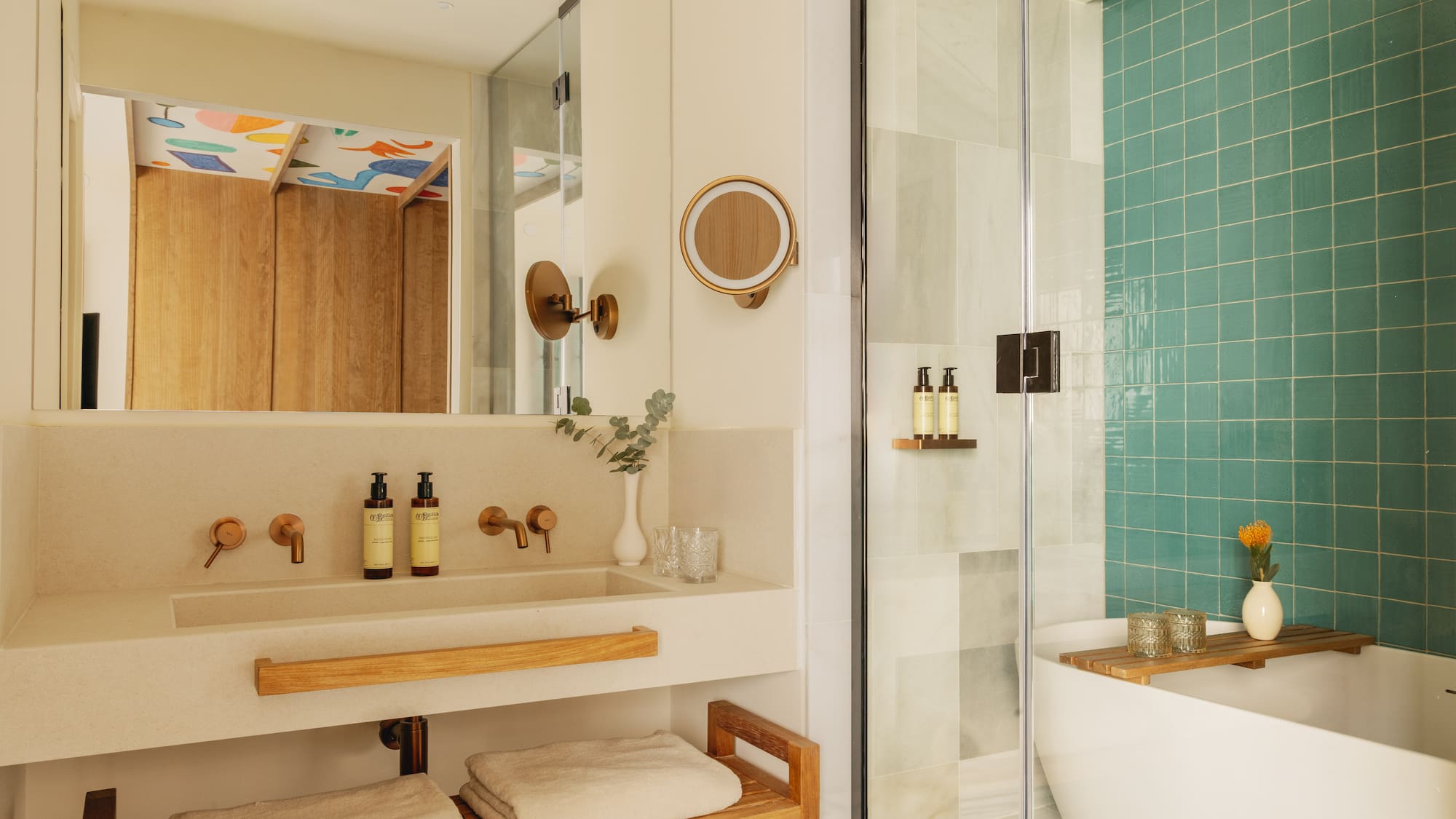 a bathroom with a shower and a sink