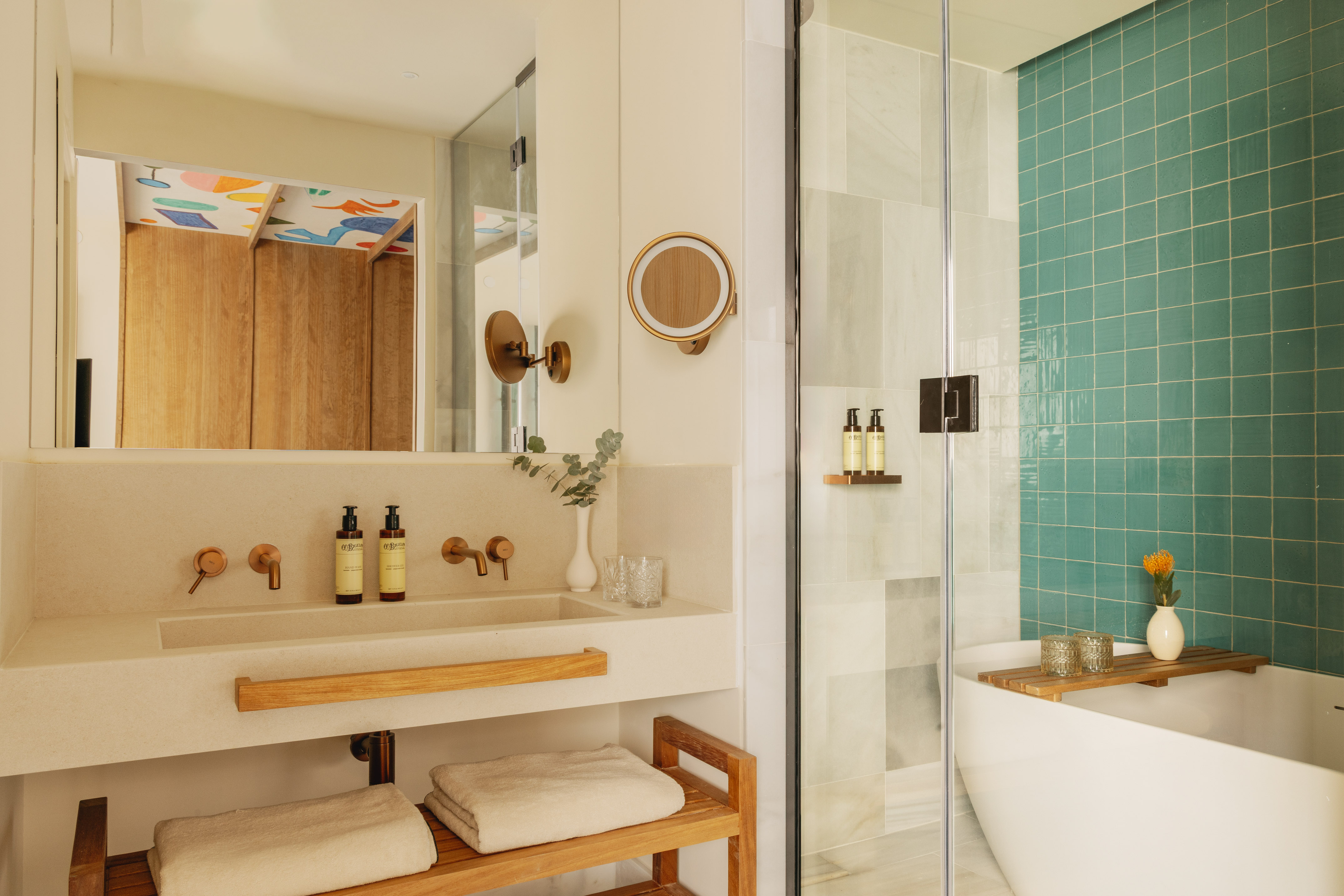 a bathroom with a shower and a sink