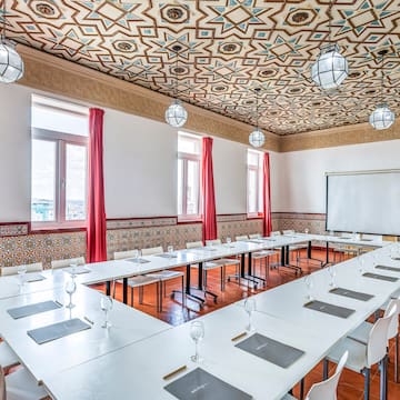 a room with tables and chairs