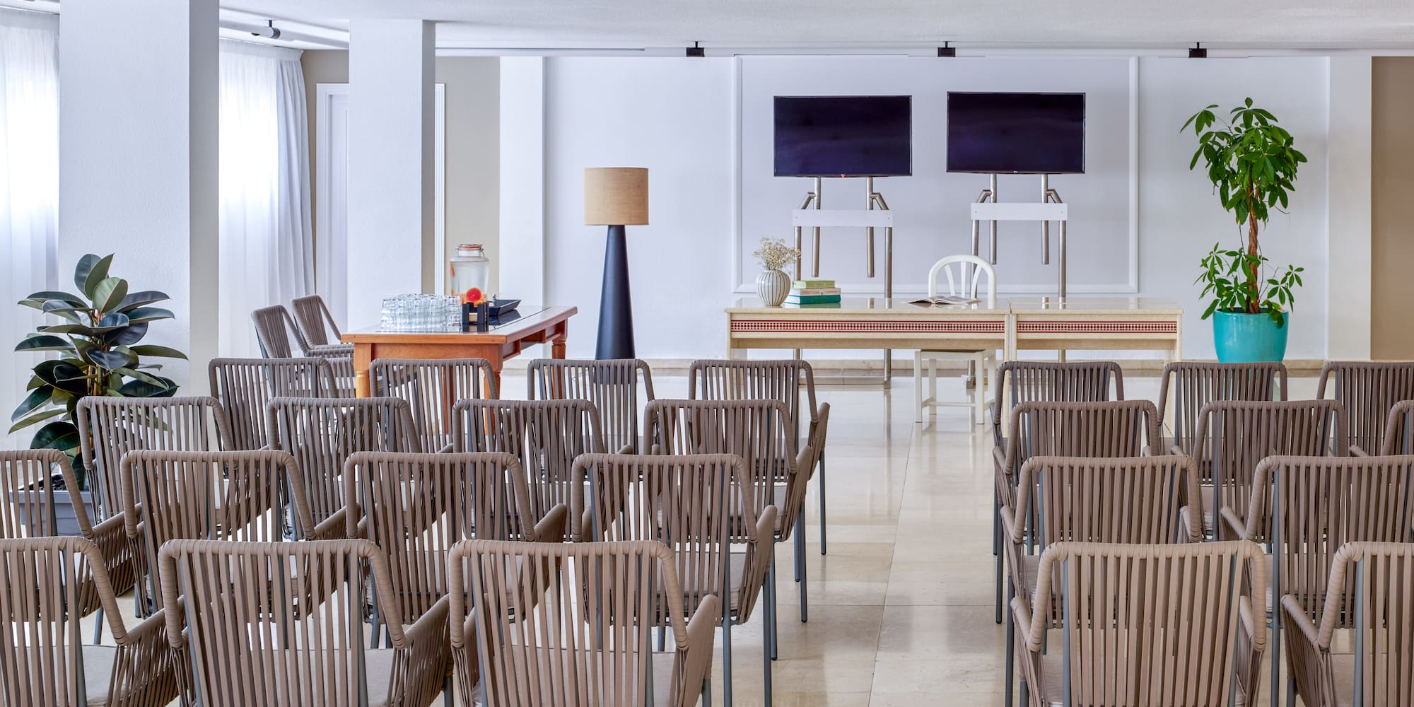 a room with chairs and a table