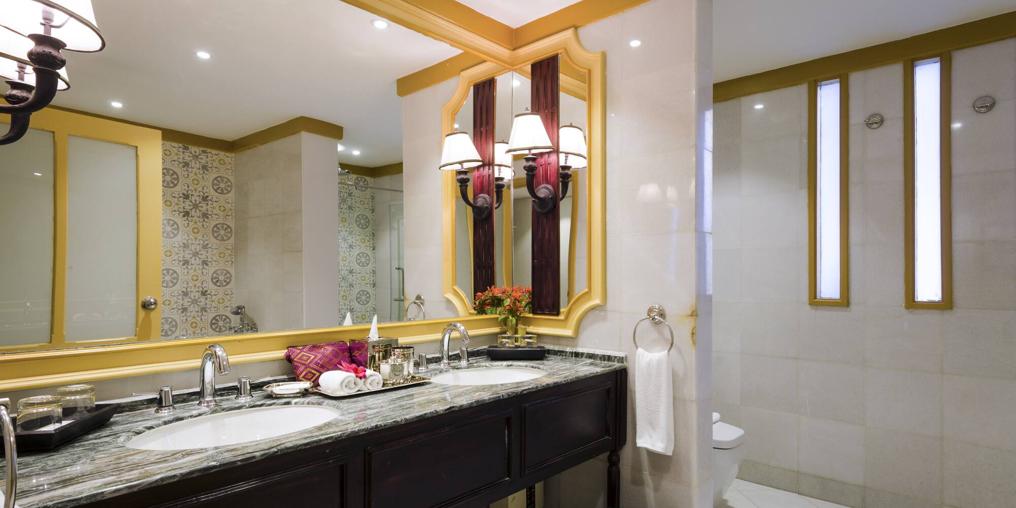 a bathroom with a mirror and sink