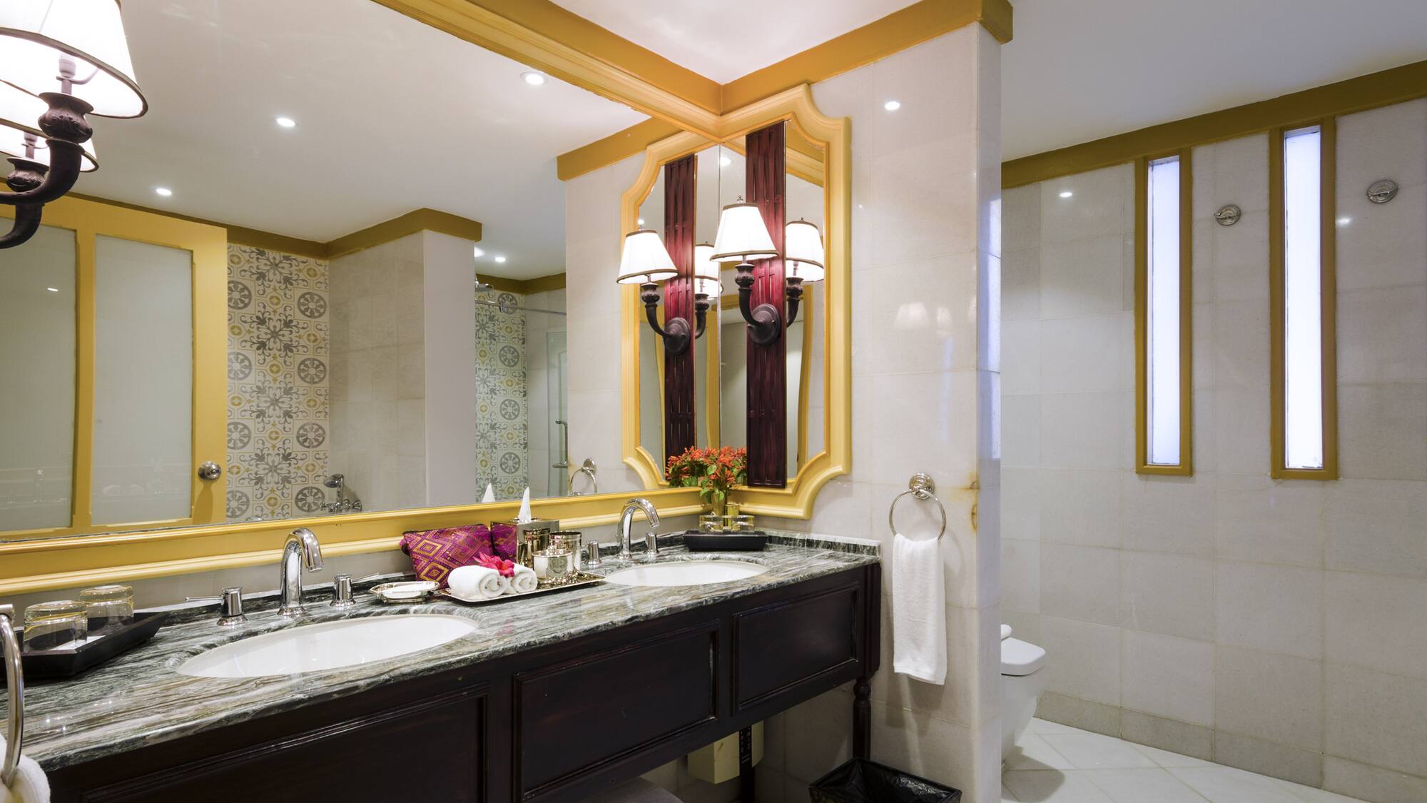 a bathroom with a mirror and sink