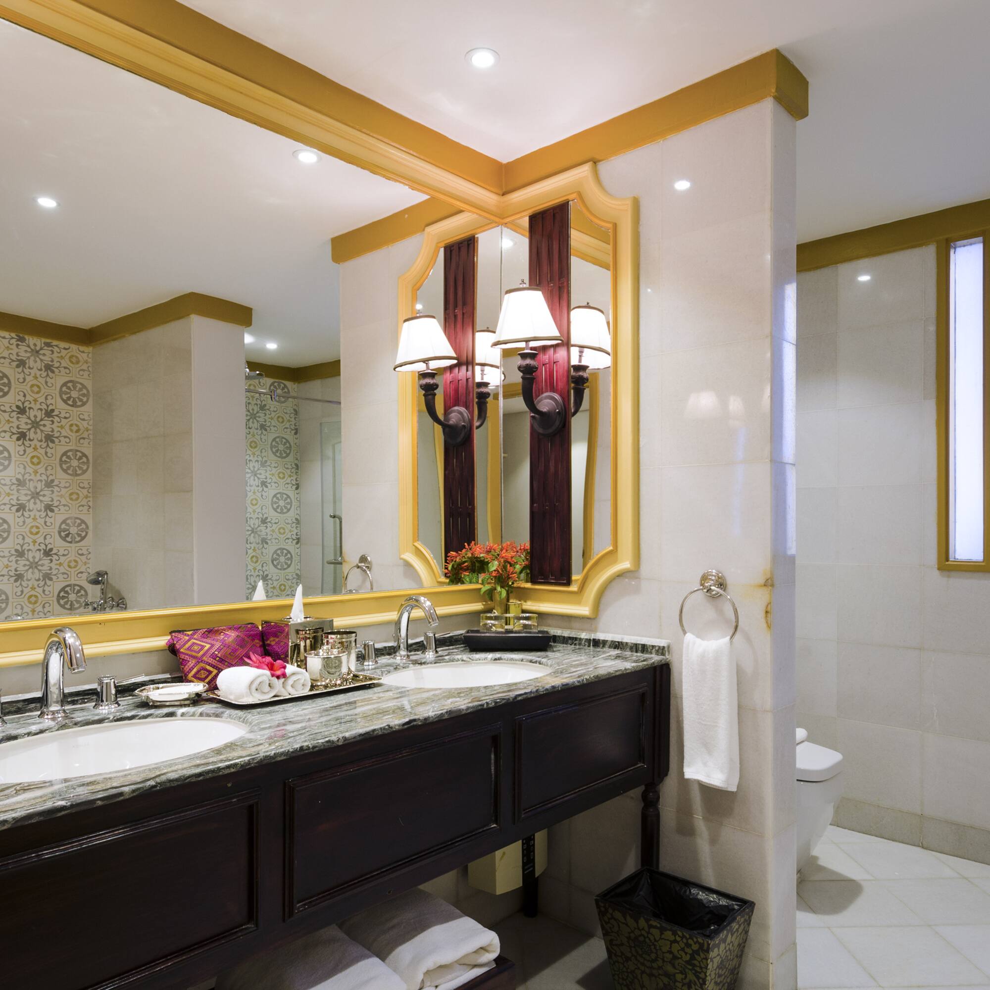 a bathroom with a mirror and sink