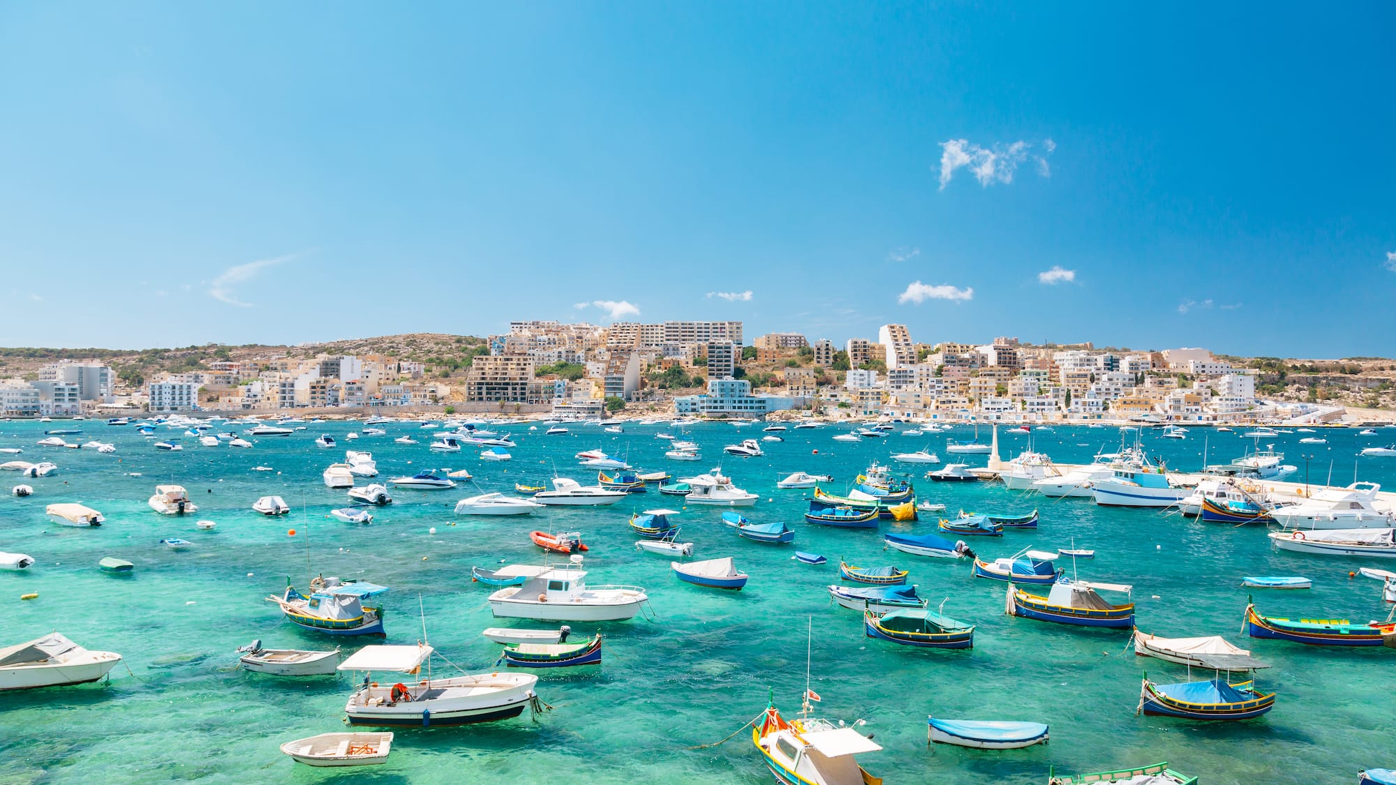 a group of boats in a body of water