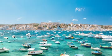 a group of boats in a body of water