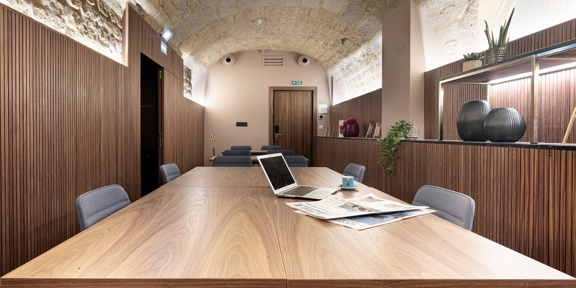 a room with a laptop on a table
