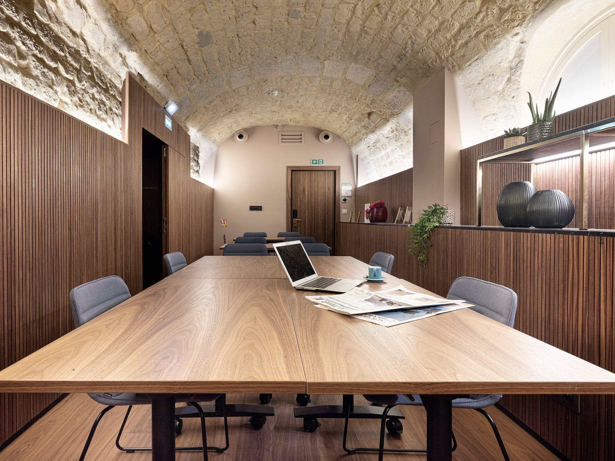 a room with a laptop on a table