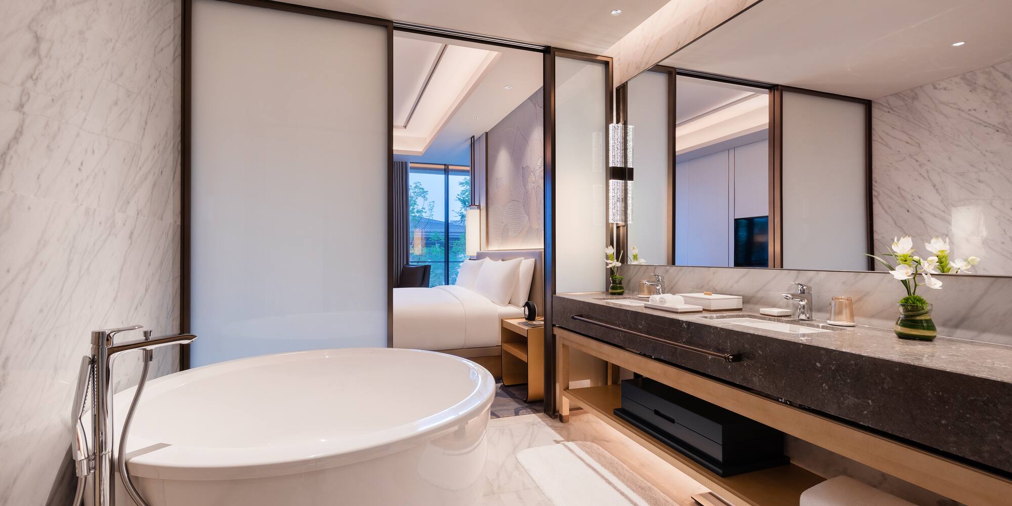 a bathroom with a tub and sink